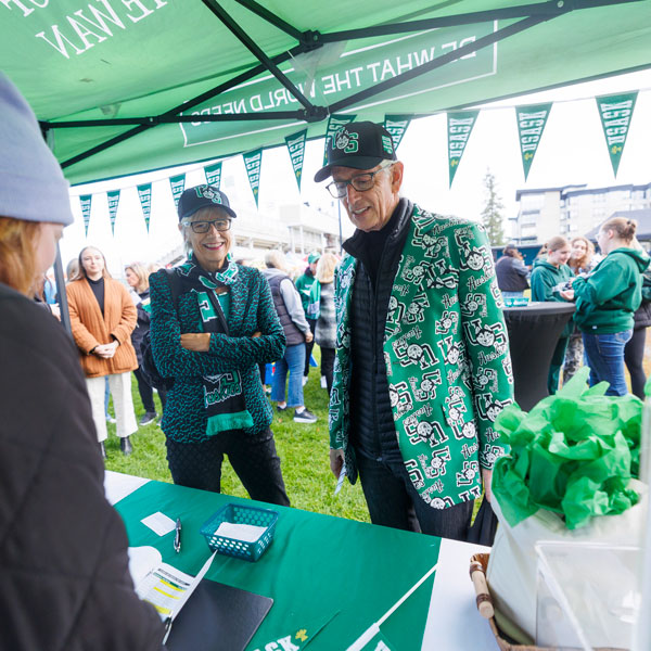 Alumni tent in Rally Alley