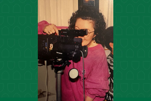 woman holding video camera
