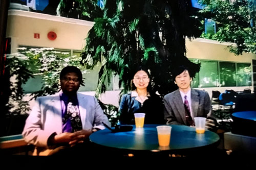 group of students sitting together at a booth